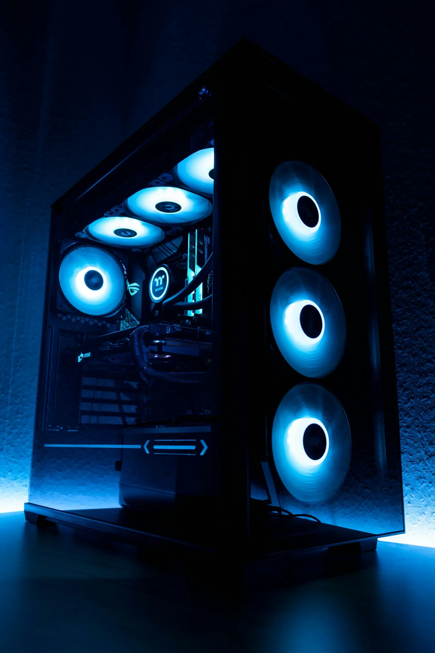 Desktop computer with blue illuminated cooling fans